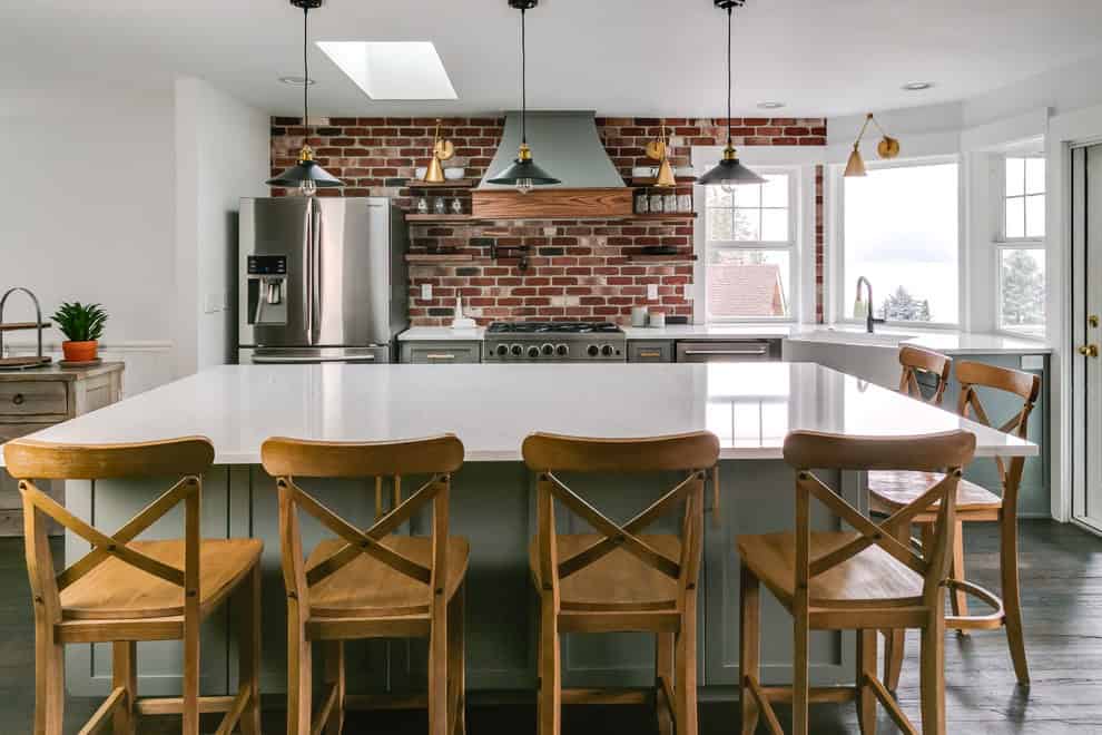 Farmhouse kitchen with white cabinets and rustic elements
